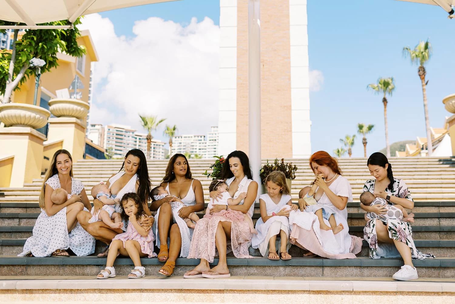 Group of mothers breastfeeding together in celebration of World Breastfeeding Week